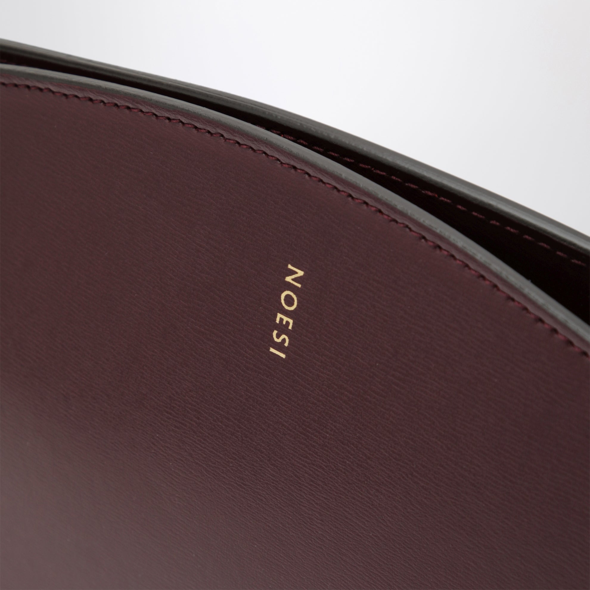Borsa Jade color prugna in pelle liscia