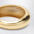 Armreif aus goldfarbenem Metall