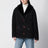 Schwarze Smiley Jacke aus Shearling