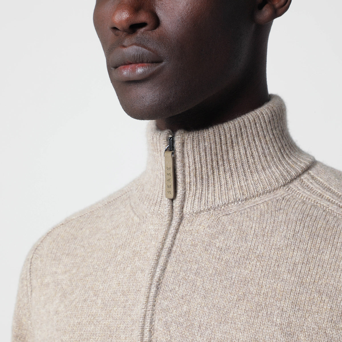 Beige melierter Kaschmirpullover mit halbem Reißverschluss
