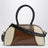 Brown/cream white leather bag with logo