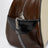 Brown/cream white leather bag with logo