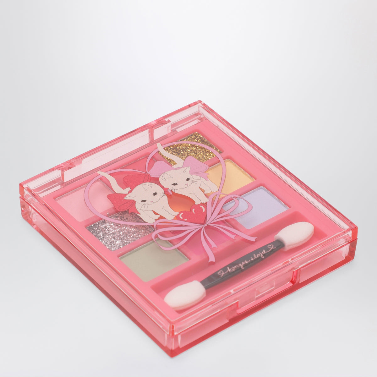 Palette de fards à paupières rose de voyage