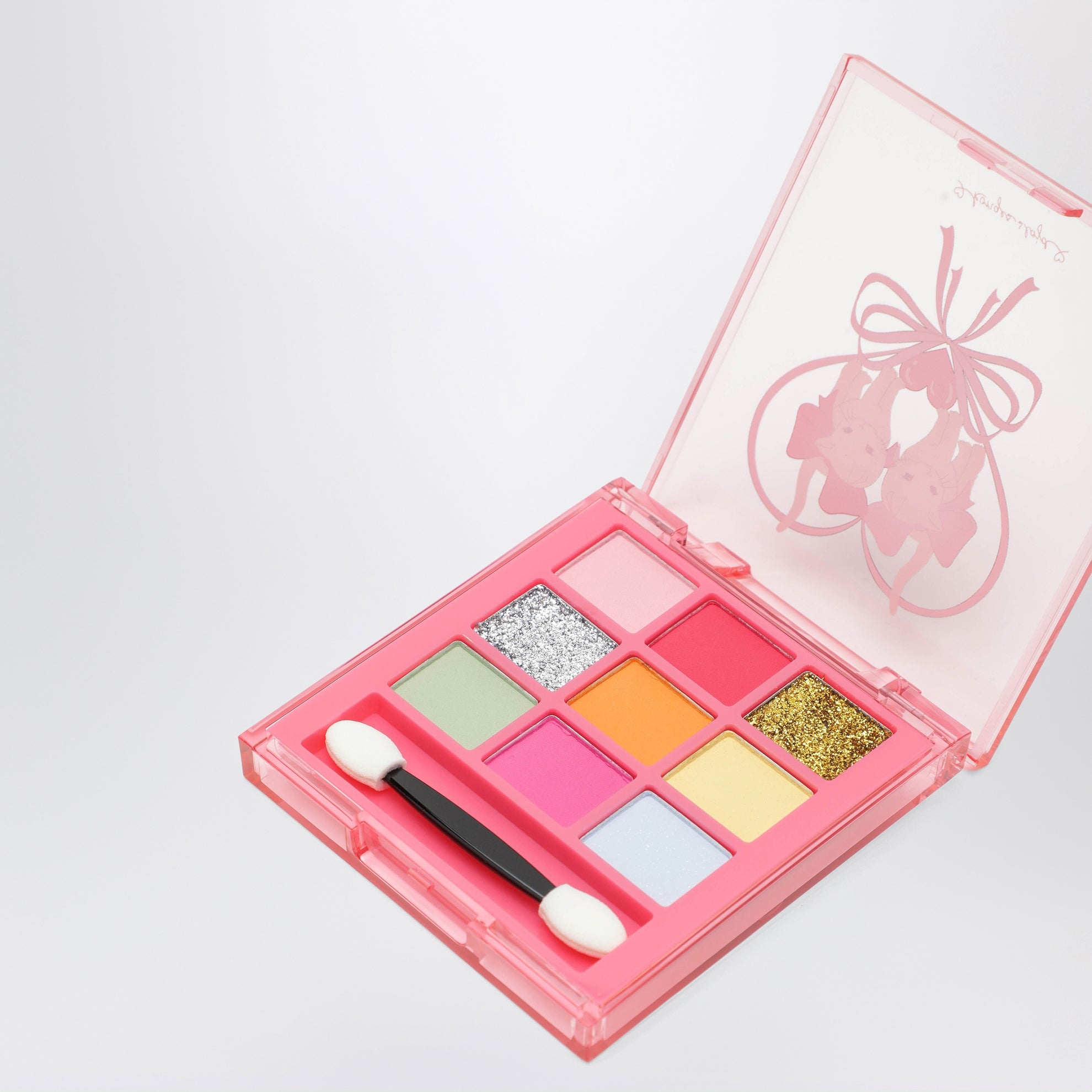 Palette de fards à paupières rose de voyage