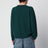 Waldgrüner Wollpullover mit Logo-Stickerei