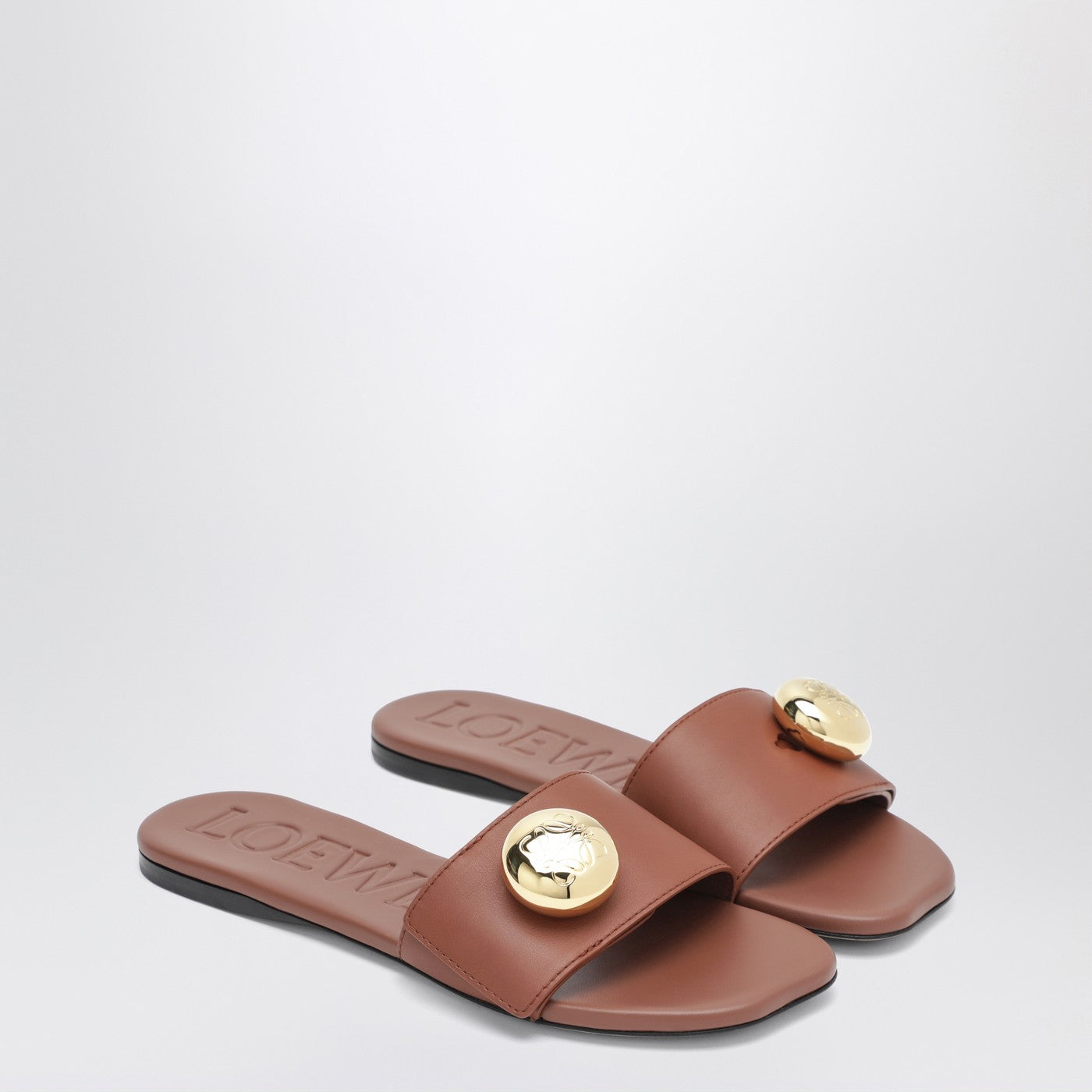 Slide Pebble color ruggine in pelle