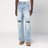 Jeans azzurro slavato con strappi