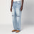 Jeans azzurro slavato con strappi