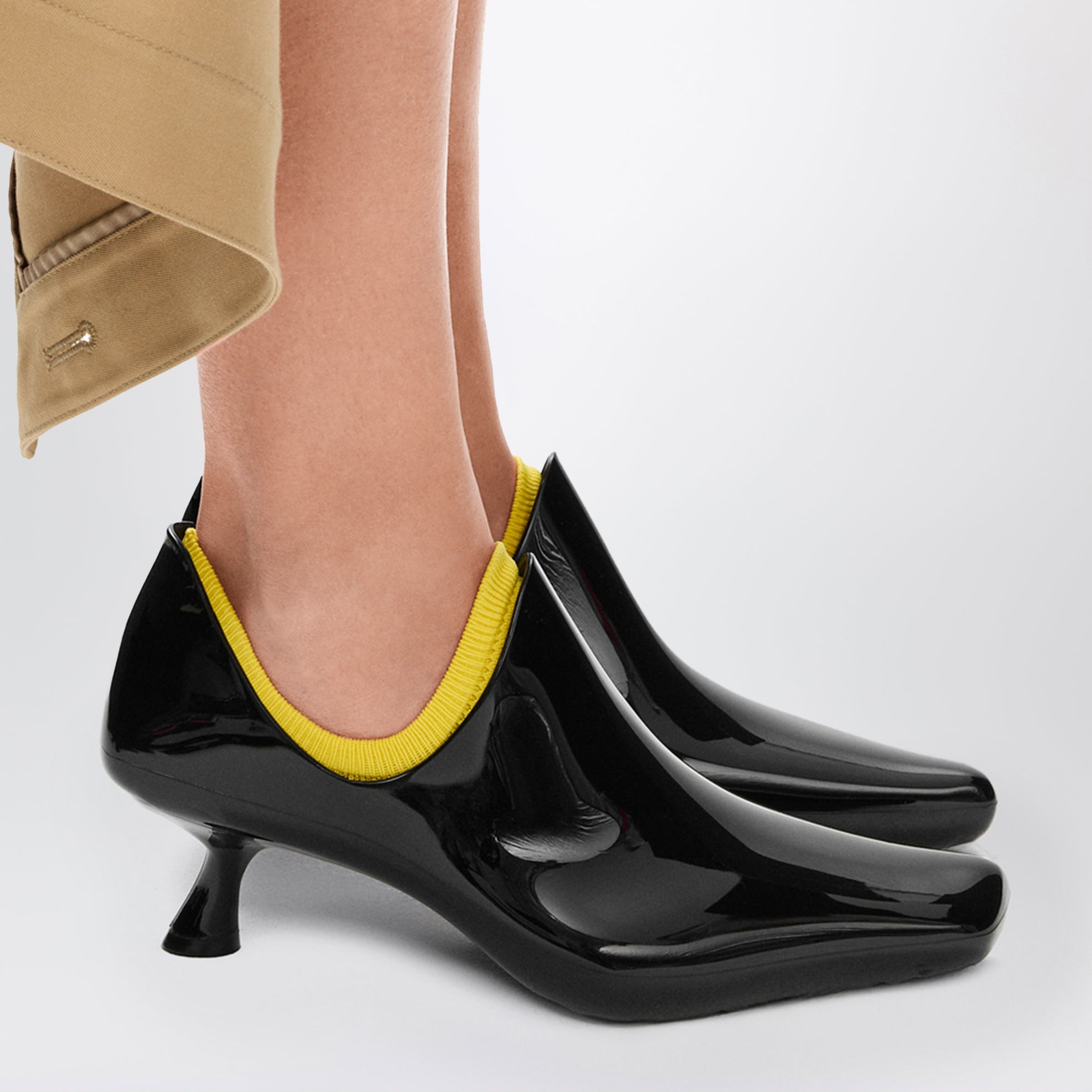 Emily Aqua ankle boots in glossy black PVC with multicolour socks