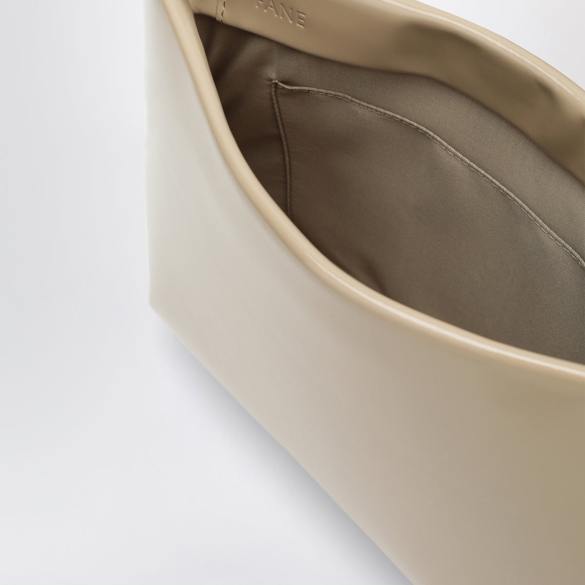 Borsa Loge beige chiara in pelle spazzolata
