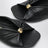 Slides Pebble Soft aus Lammnappa in Schwarz