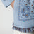 Hellblaue Strickjacke mit Bandana-Jacquardmuster