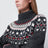 Grauer Rollkragenpullover mit Fair-Isle-Muster