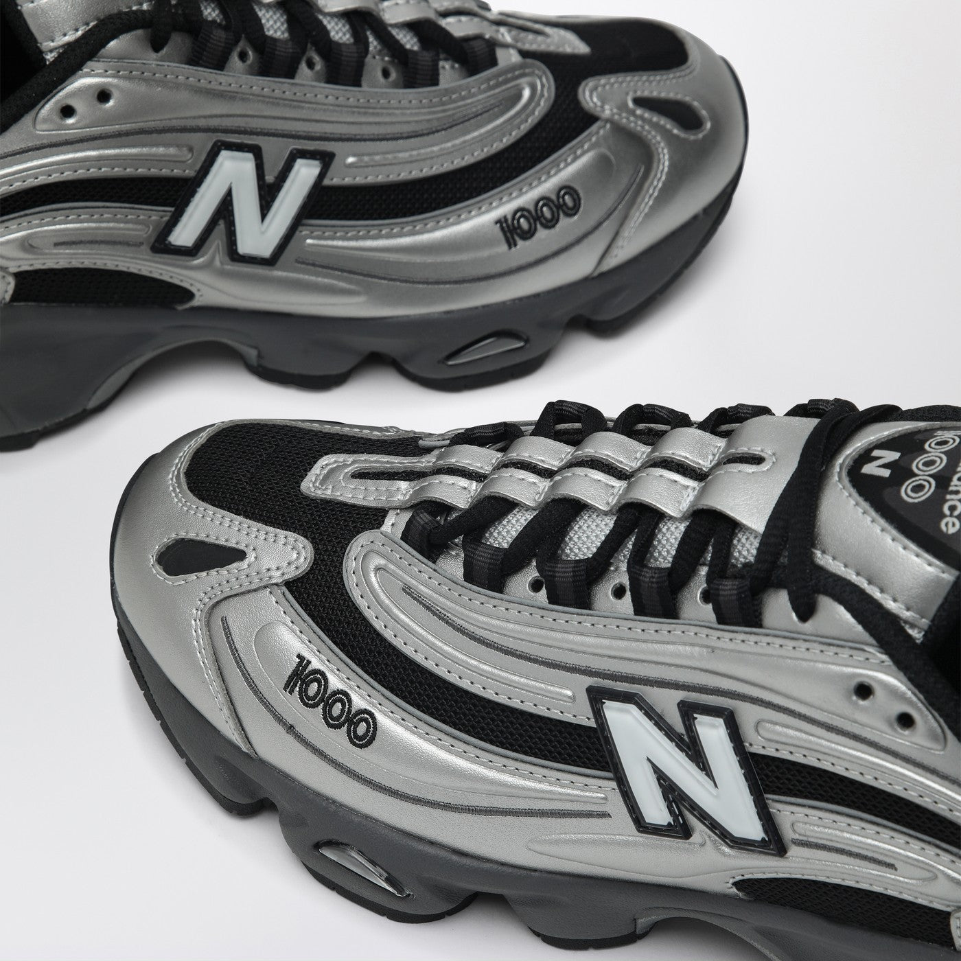 Sneakers 1000 SL in metallic silver leather