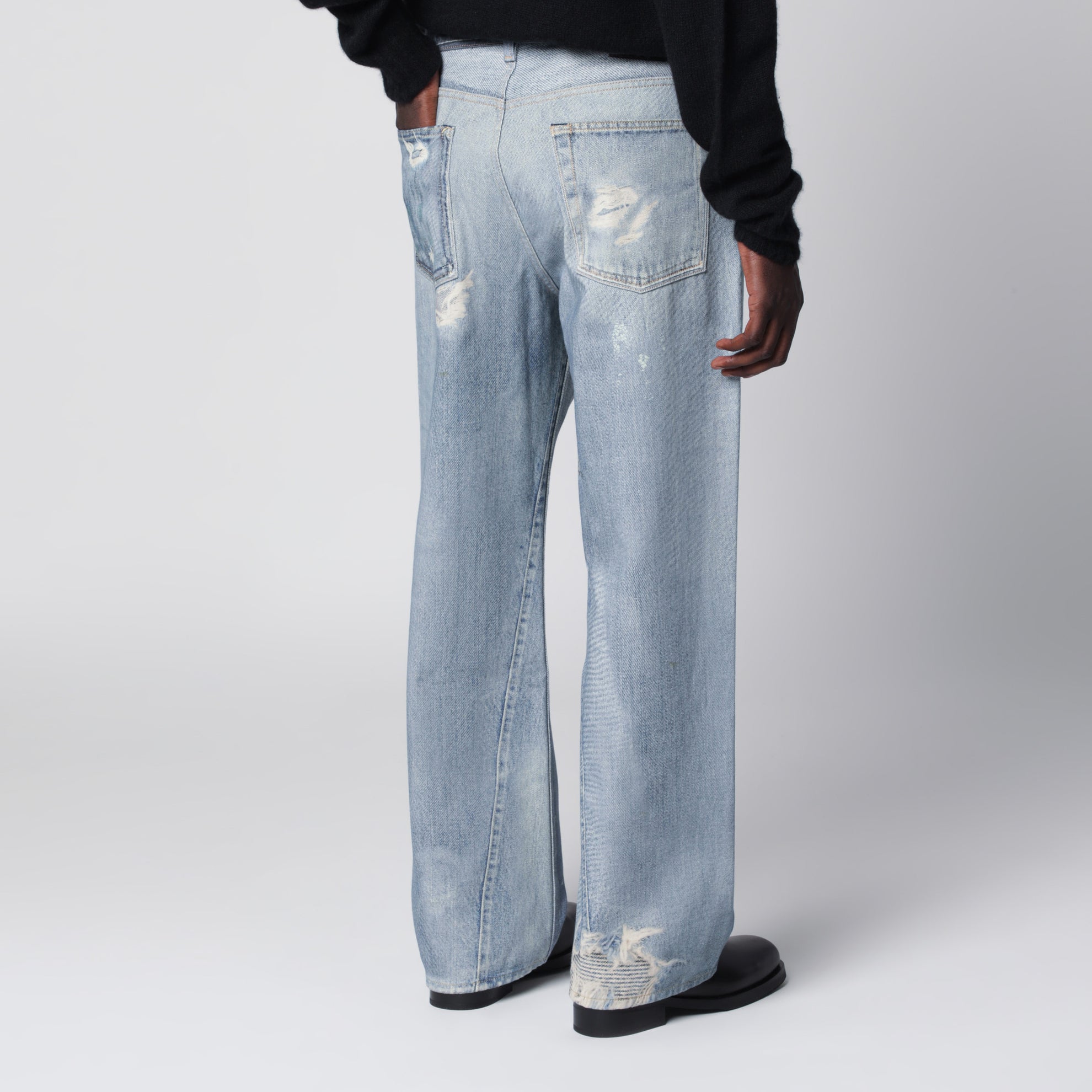 Light-wash distressed jeans