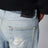 Light-wash distressed jeans