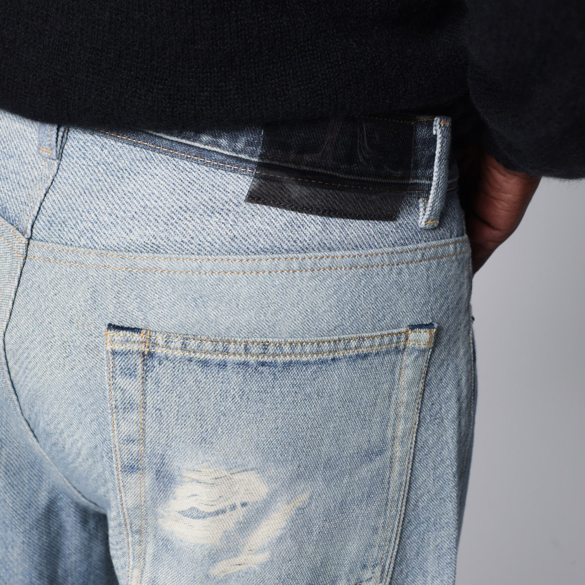 Light-wash distressed jeans
