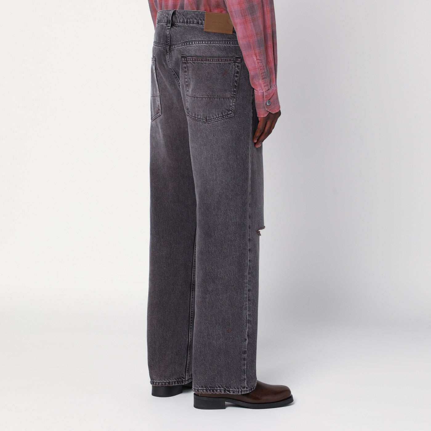 Faded effect jeans with rips