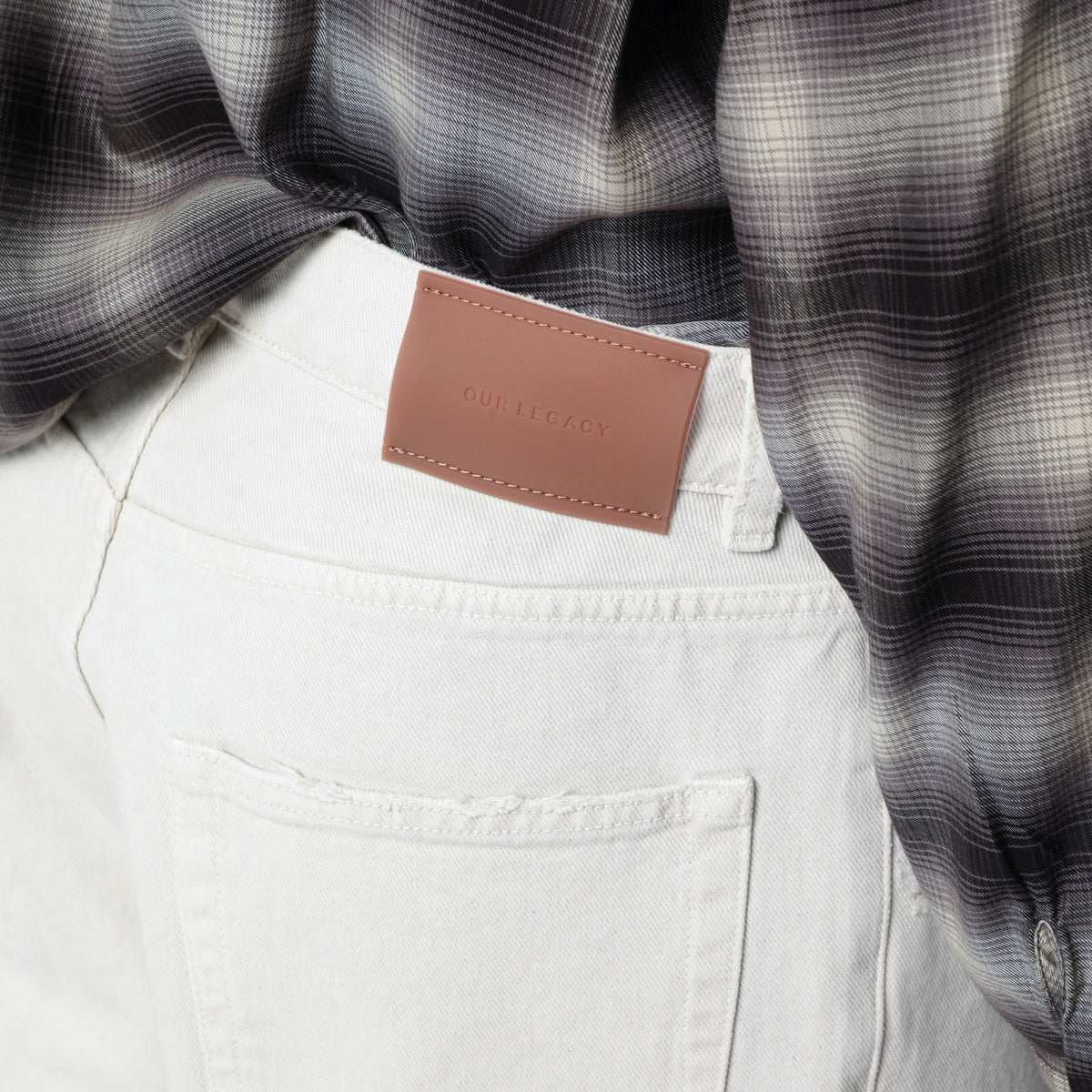 Chalk white wide-leg jeans with rips