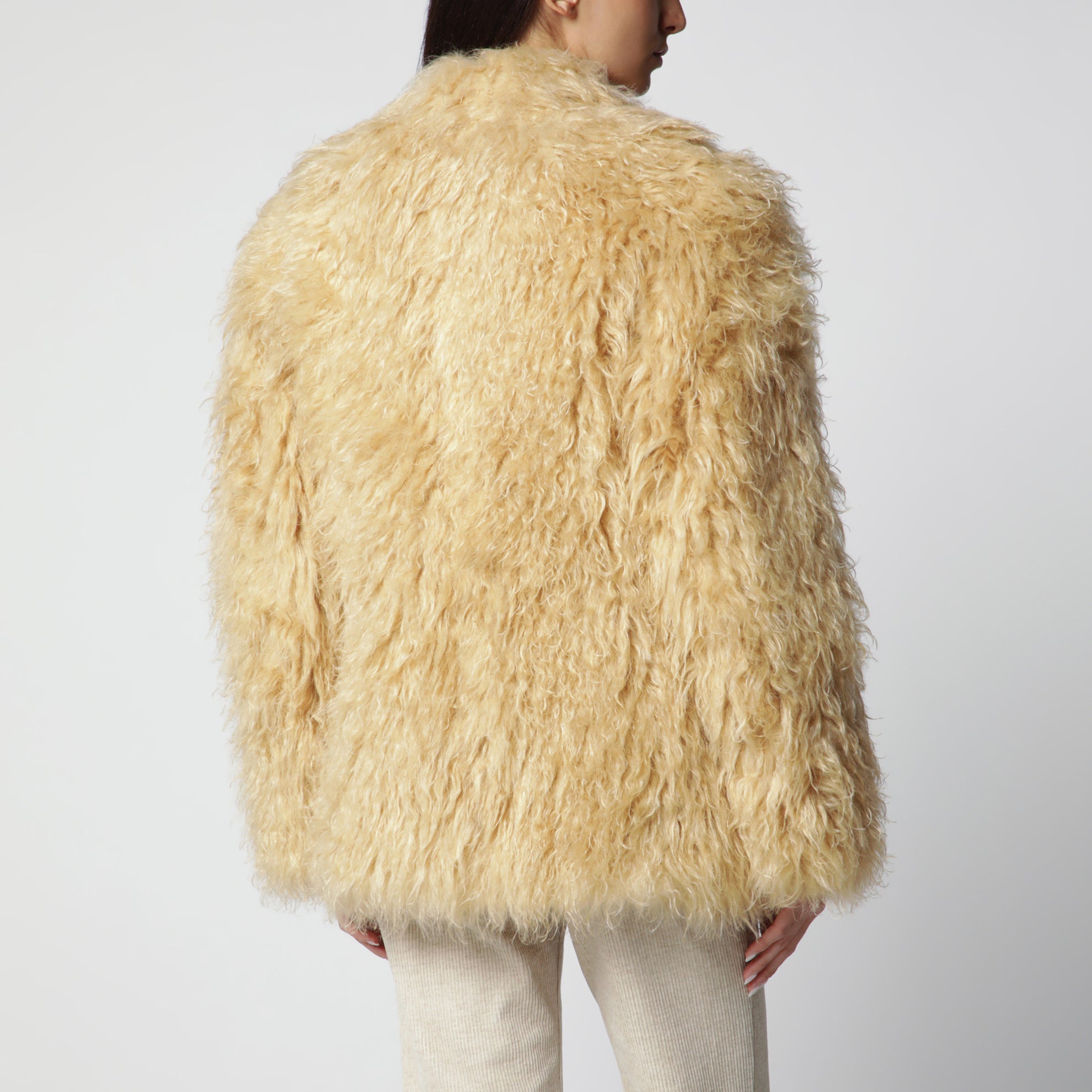 Pale yellow long-haired faux fur coat