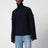 Dunkelnavyblauer Rollkragenpullover aus Rippstrickwolle