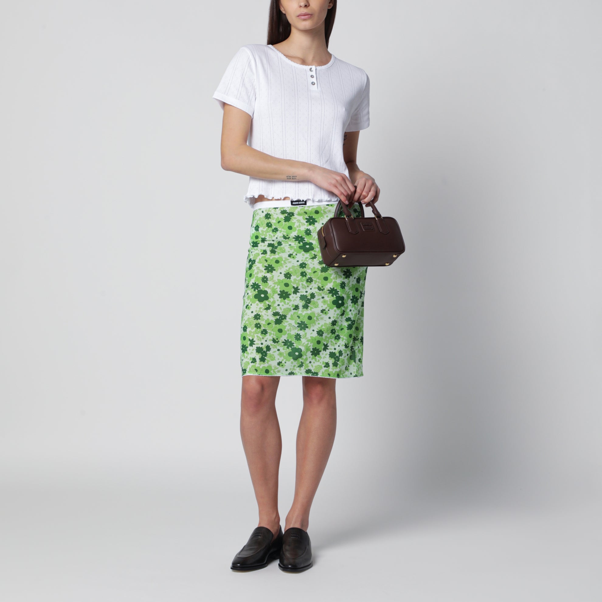 Green skirt with floral pattern