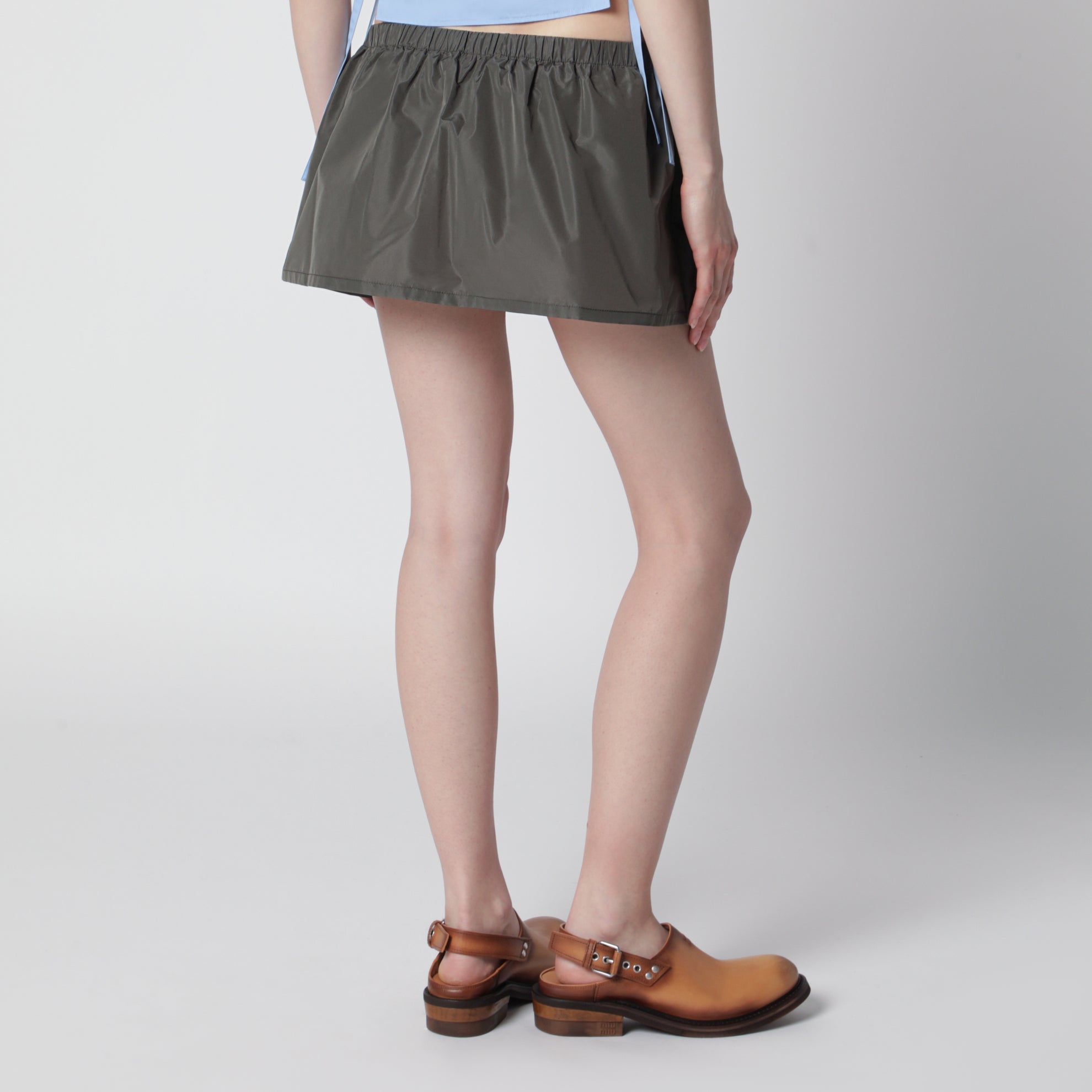 Tela Tec miniskirt with front pocket