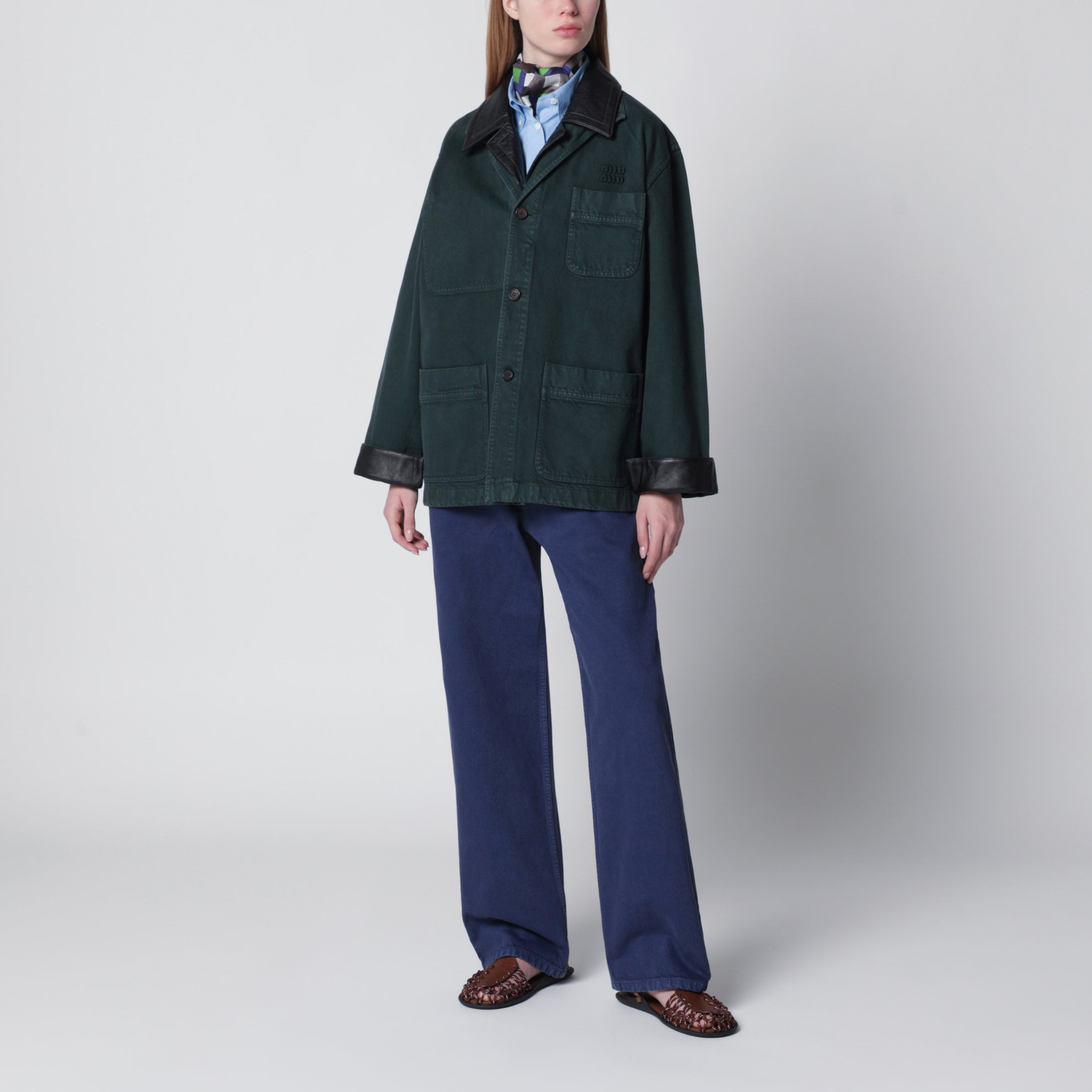 Bottle green gabardine and leather jacket