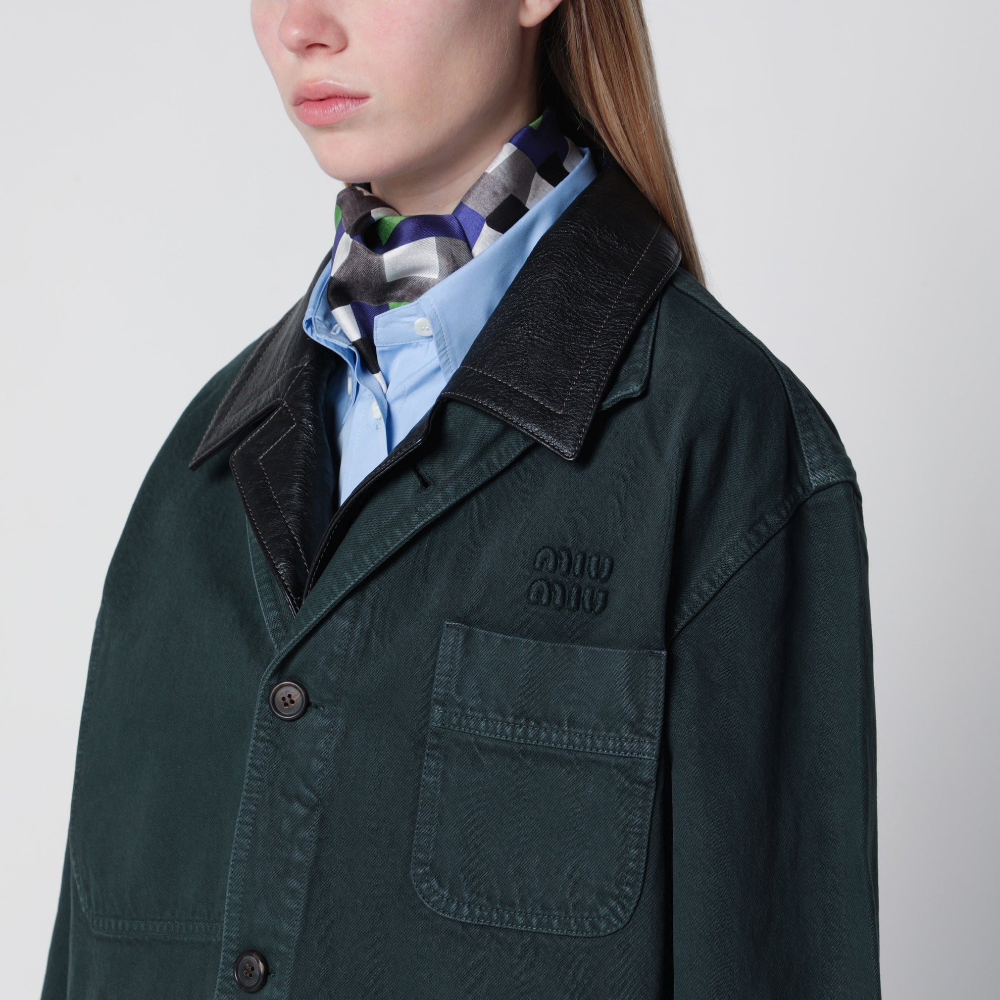 Bottle green gabardine and leather jacket