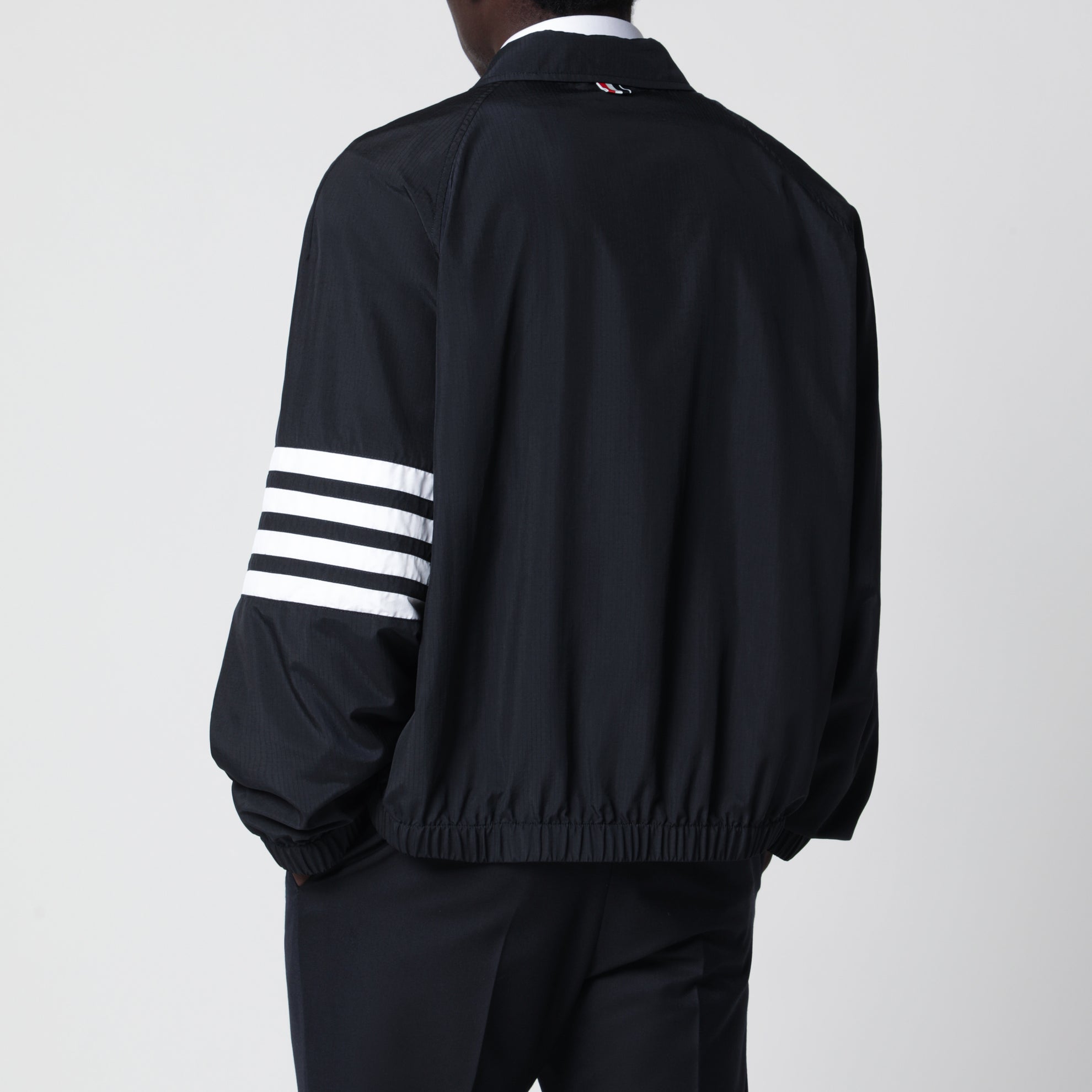 Lightweight navy blue zip-up jacket