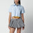 Light blue cropped poplin shirt with ruffles