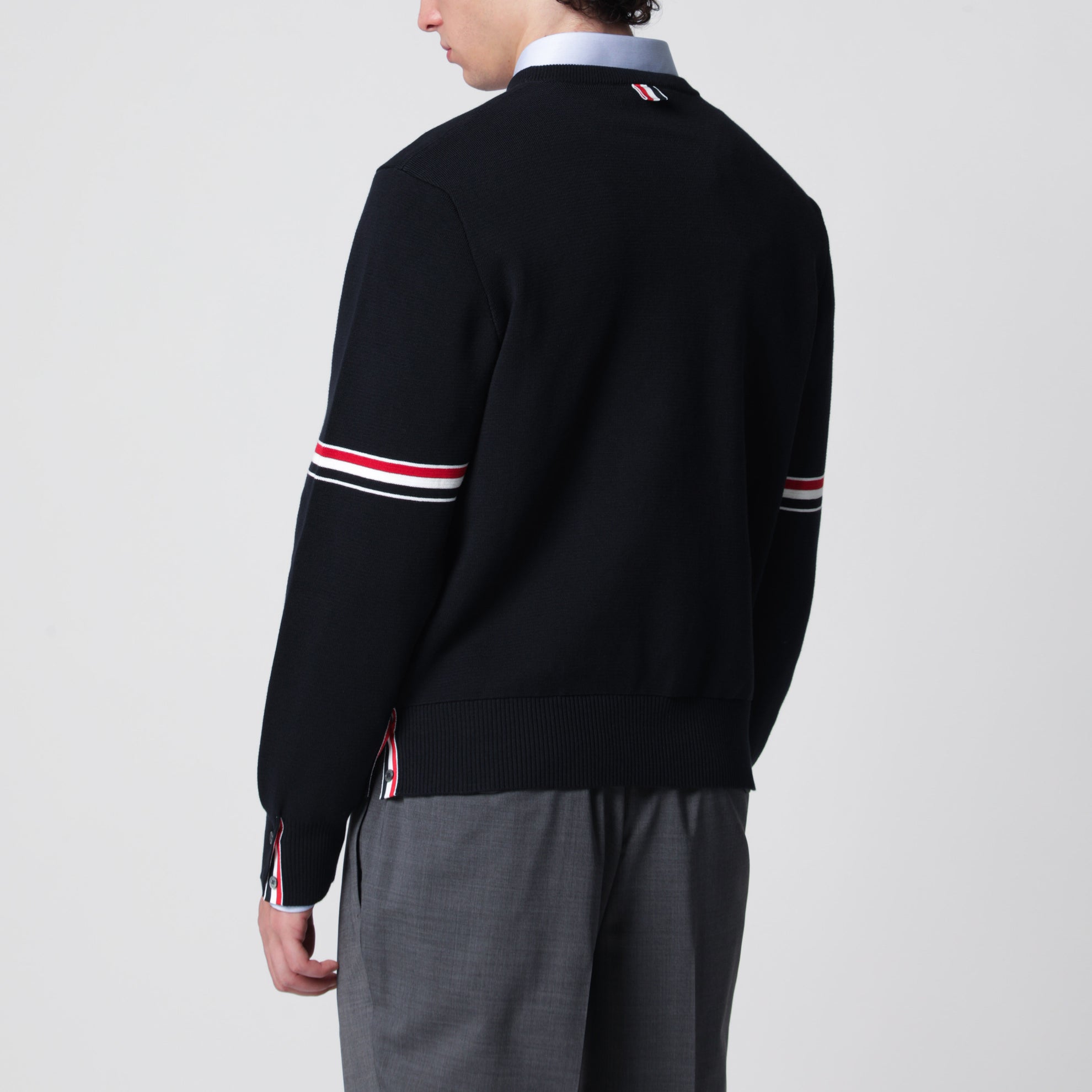 Navy blue cotton sweater with tricolor details
