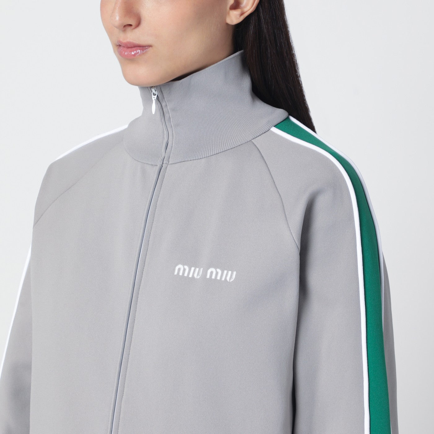 Sweat zippé gris/vert en fil technique