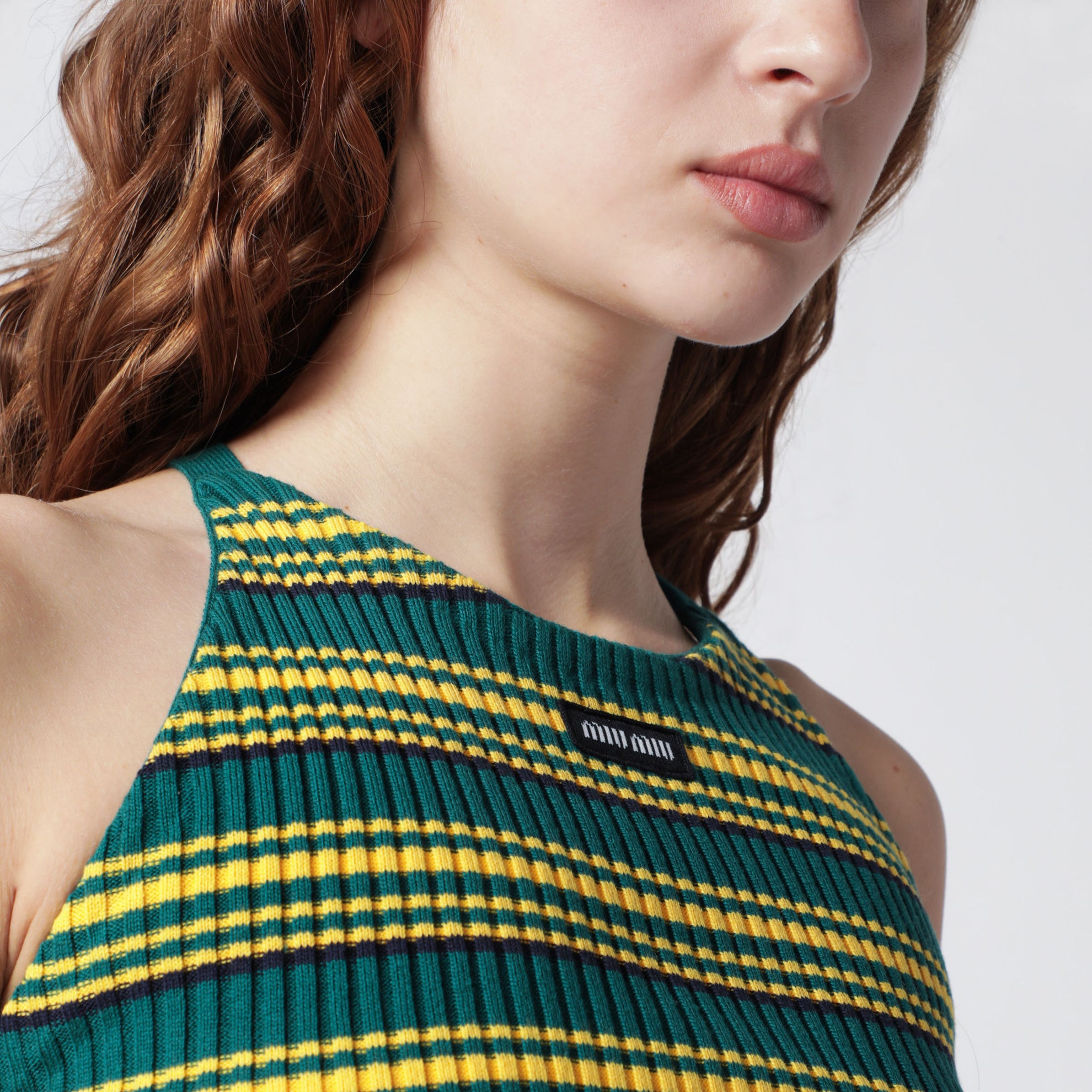 Top a righe verde bottiglia e giallo