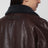 Blouson marron en cuir avec shearling gris