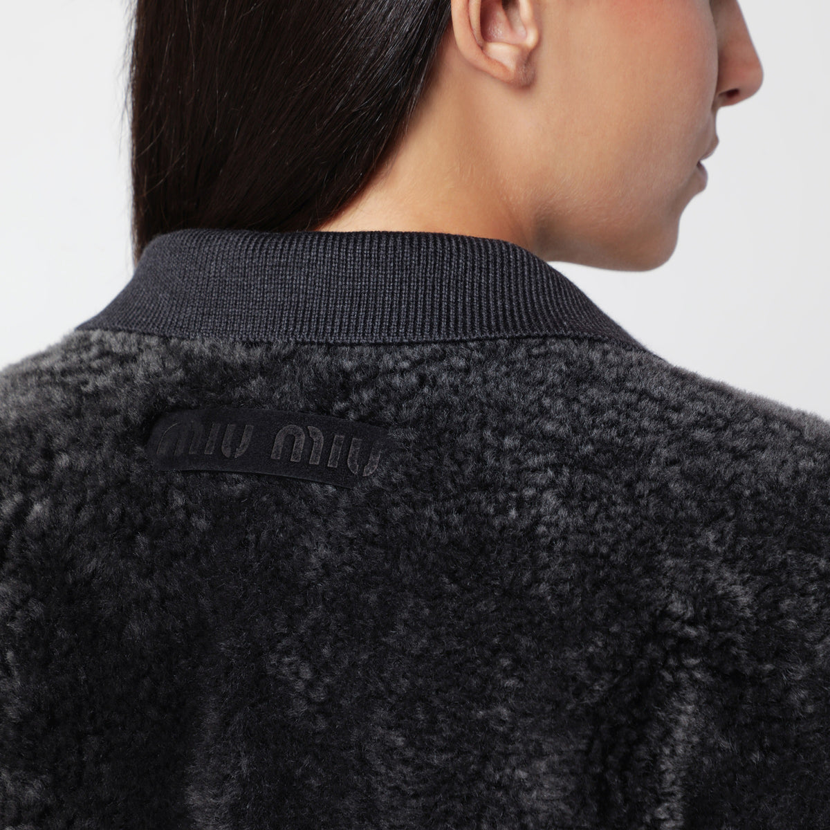 Blouson grigio in montone e maglia