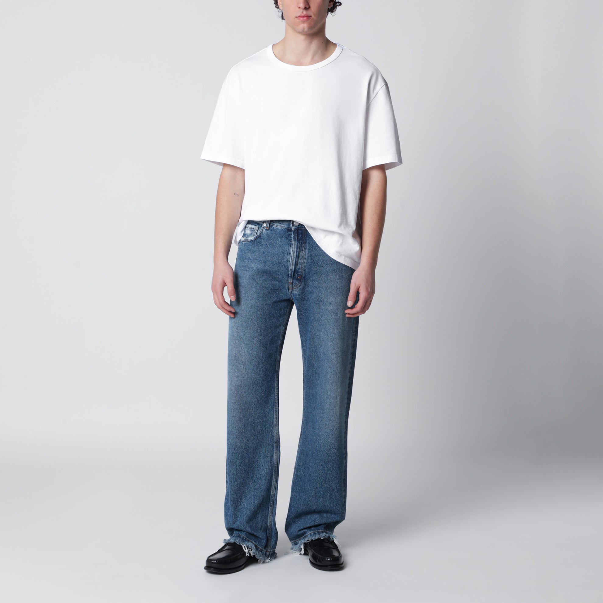 Jeans Frayed Cut  con frange sulle tasche