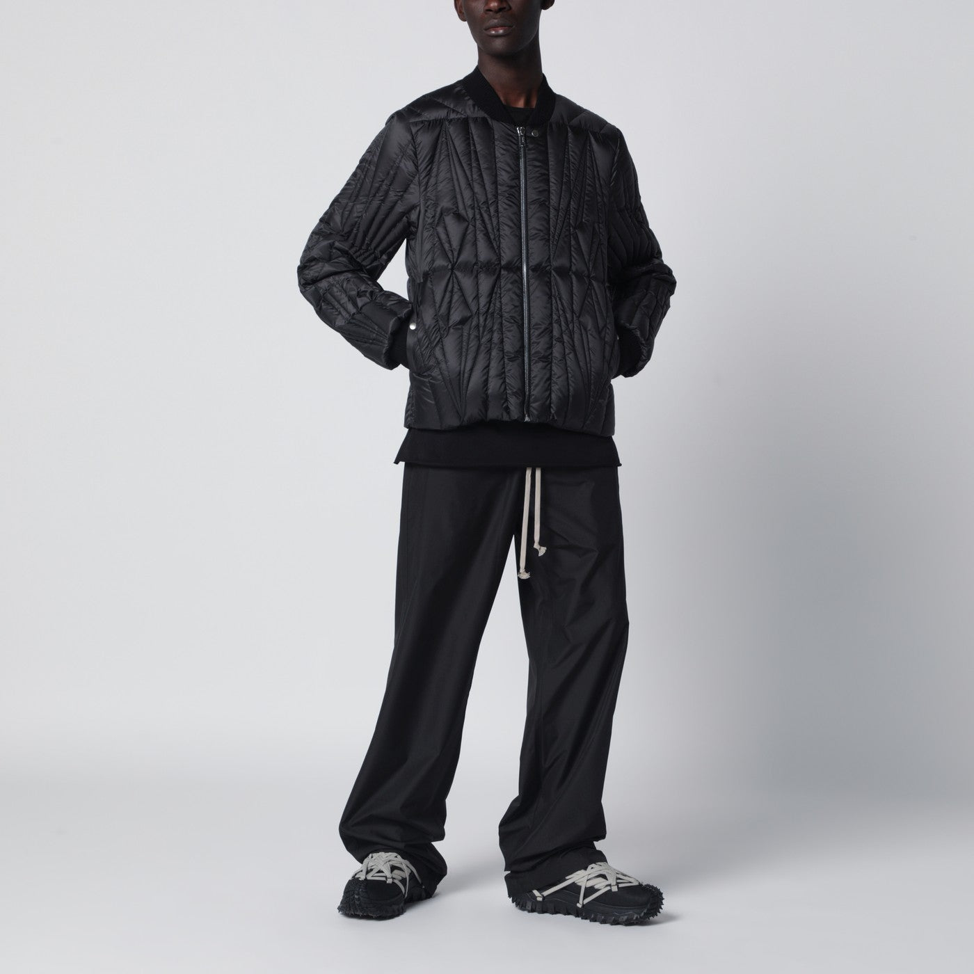 Piumino trapuntato con zip nero