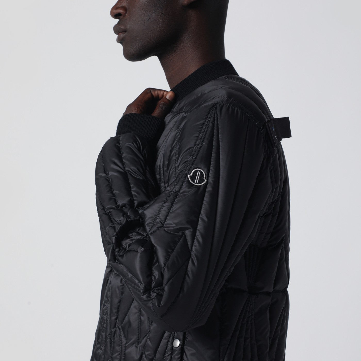 Piumino trapuntato con zip nero