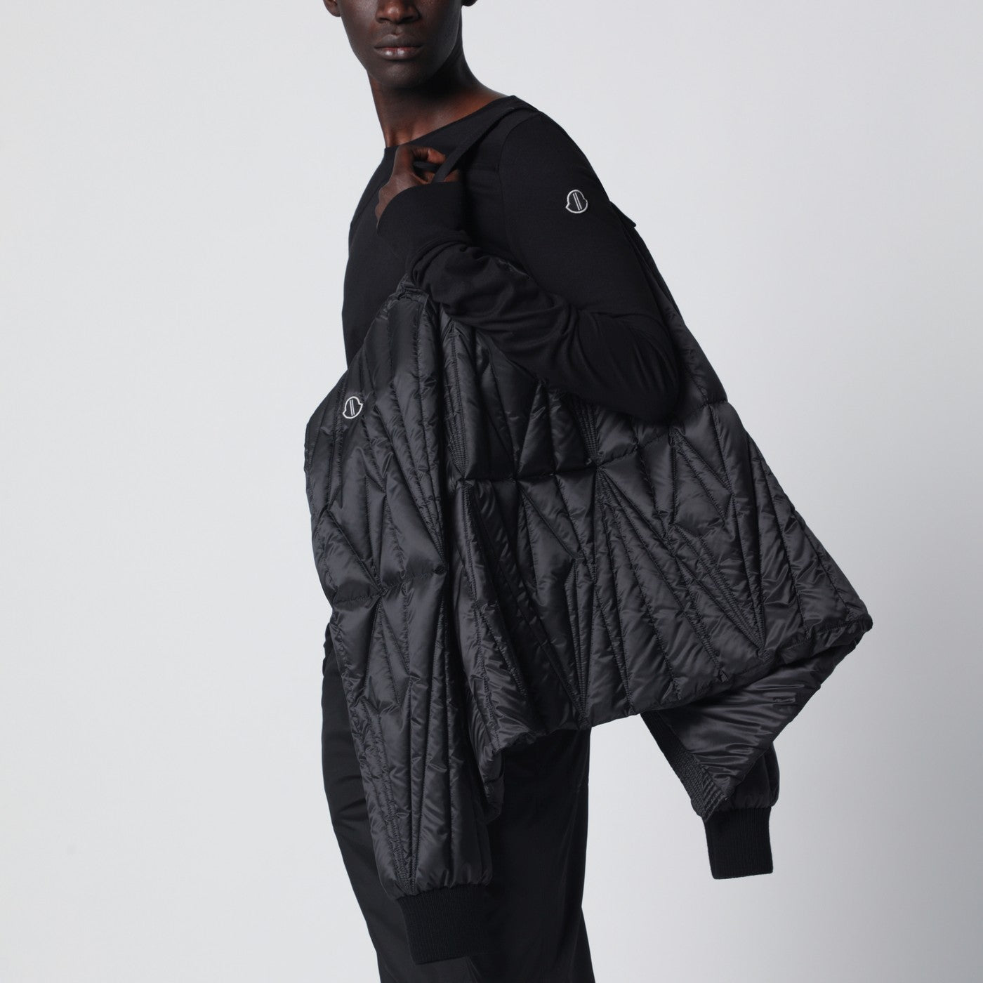 Piumino trapuntato con zip nero
