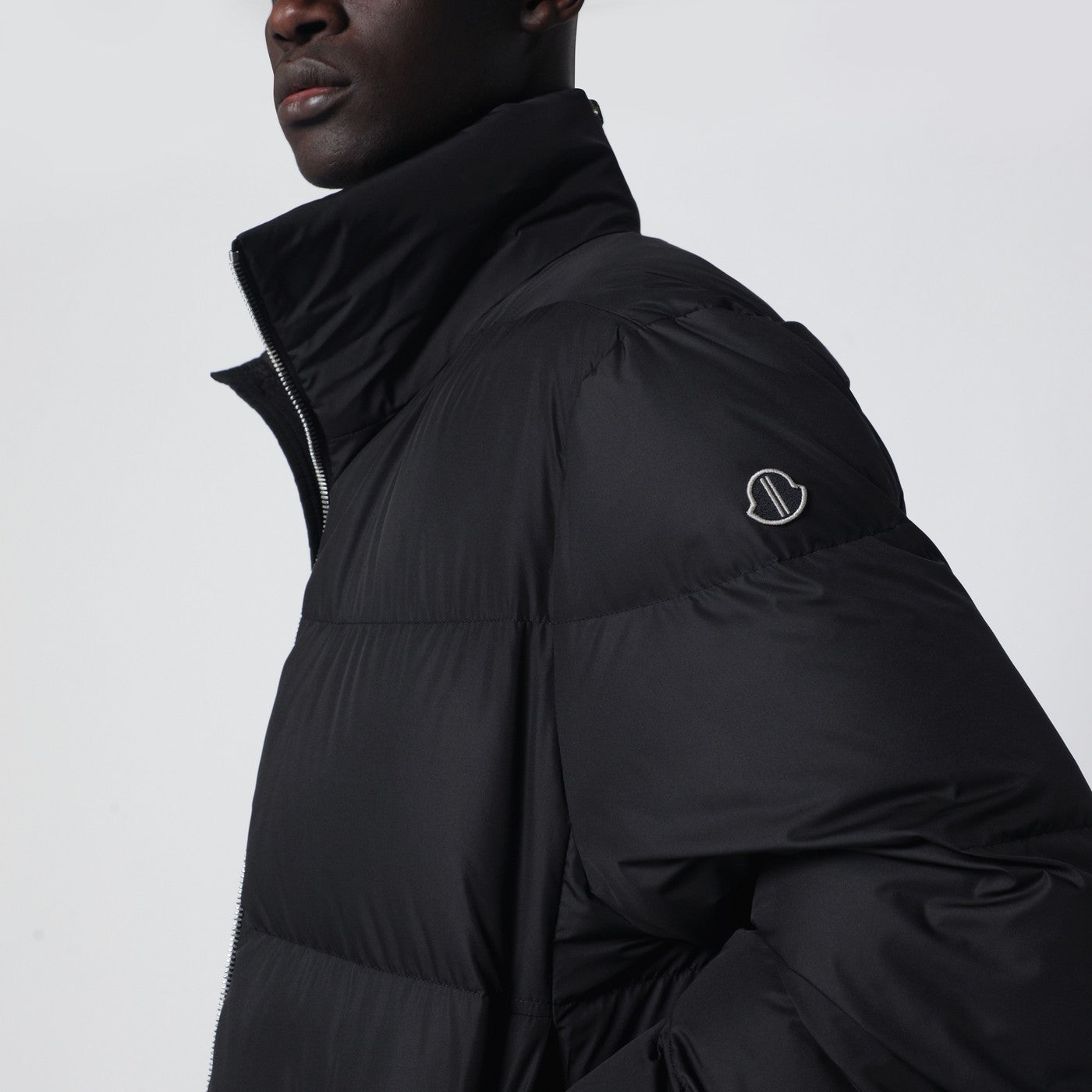 Piumino con zip nero