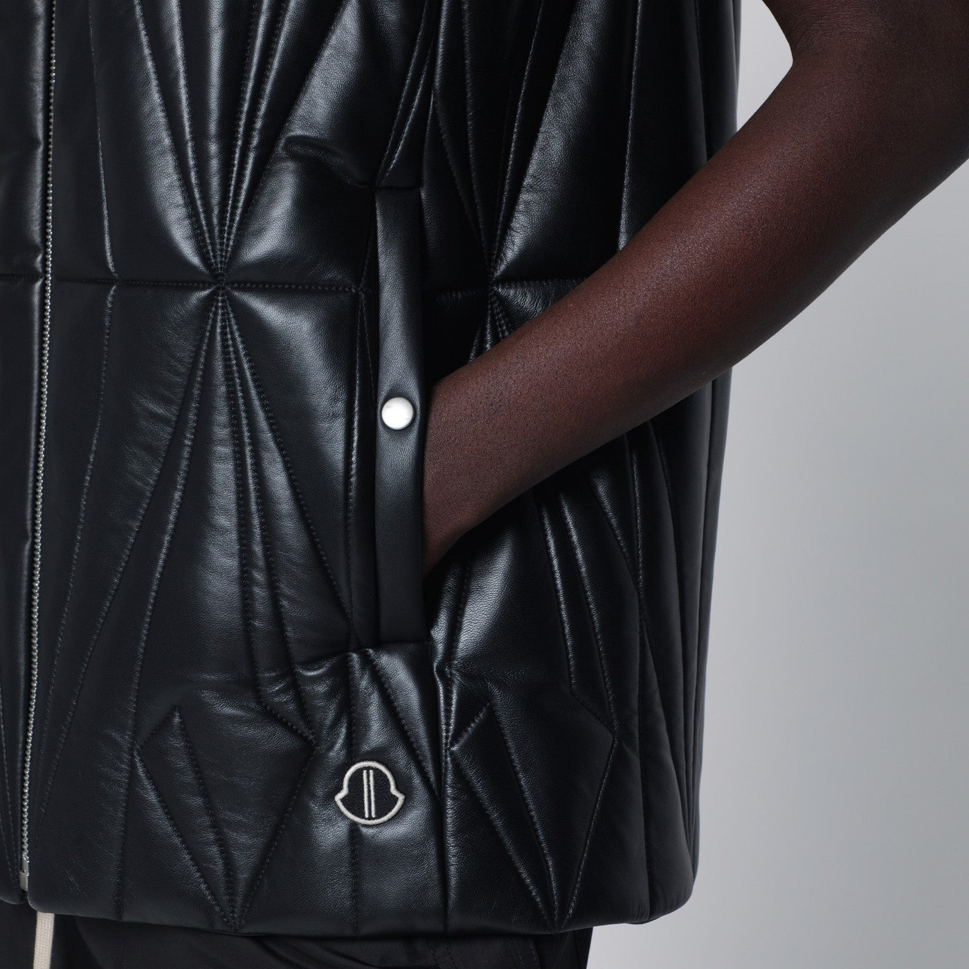 Black faux leather zip-up vest