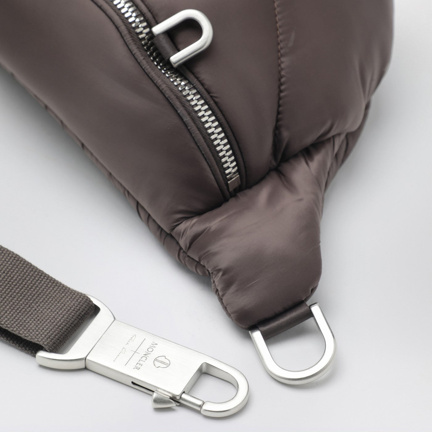 Quilted belt bag in mud color