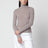 Pull col roulé beige chiné en laine vierge