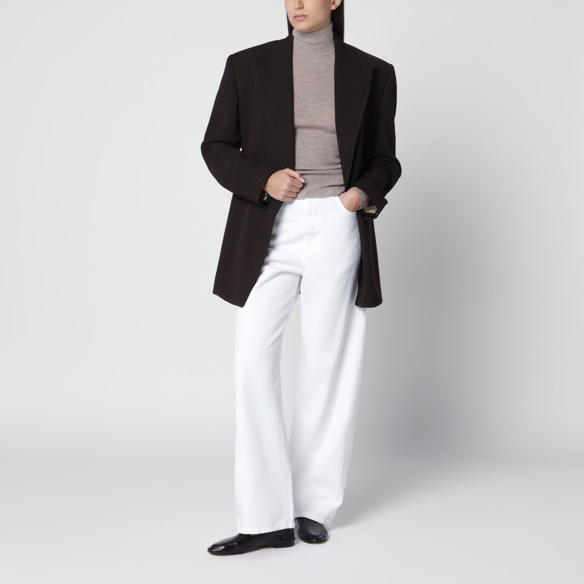 Pull col roulé beige chiné en laine vierge