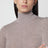 Pull col roulé beige chiné en laine vierge