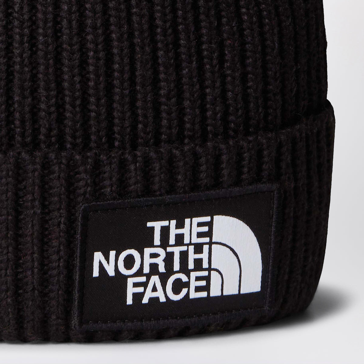 Black beanie with logo patch