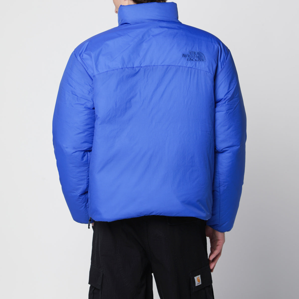 Blue and black reversible Nuptse jacket in nylon