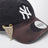 Casquette New Era 9TWENTY bleu marine 07 avec pin's