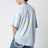 T-shirt celeste con stampe logo